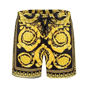 Мужские шорты в новом летнем стиле с карманами, мужские плавки с золотым принтом, высококачественные, быстросохнущие для пляжного плавания. Изображение